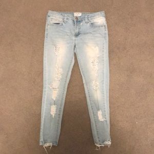 light blue ripped jeans